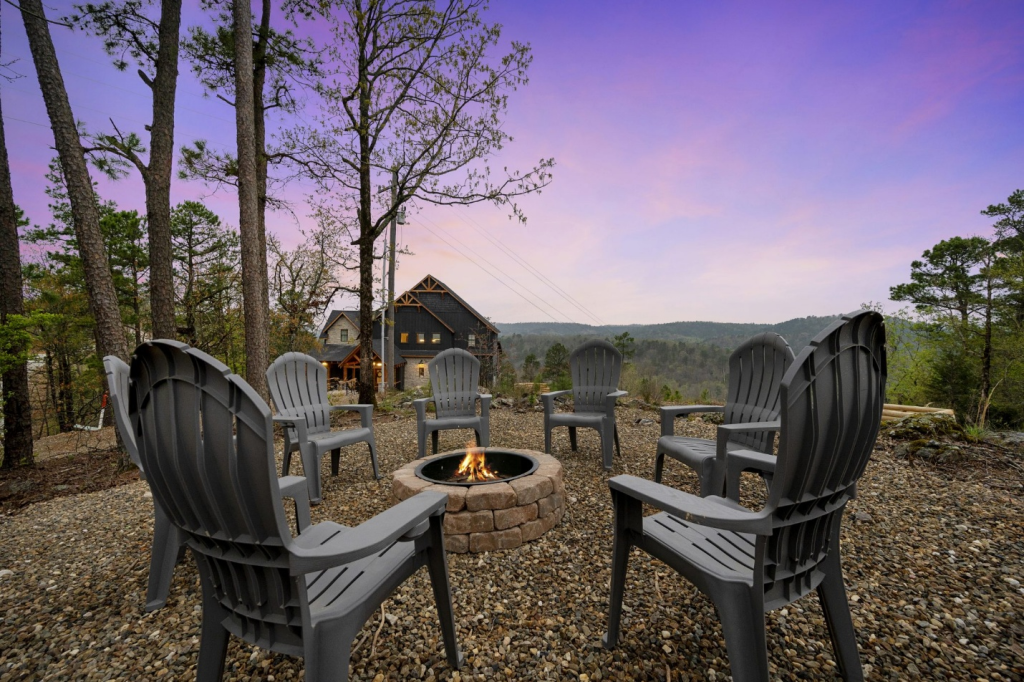 an outdoor space with a firepit.